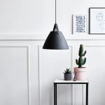 designer strapped leather pendant