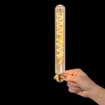 Warm white tube light in hands